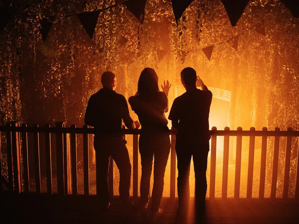 TWOTW Three People On Balcony Backlit (1)
